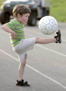 Boy playing soccer