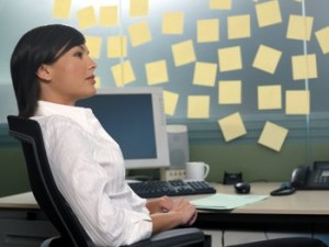 Office worker with post-it notes
